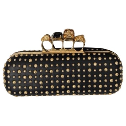 Knuckle leather clutch bag