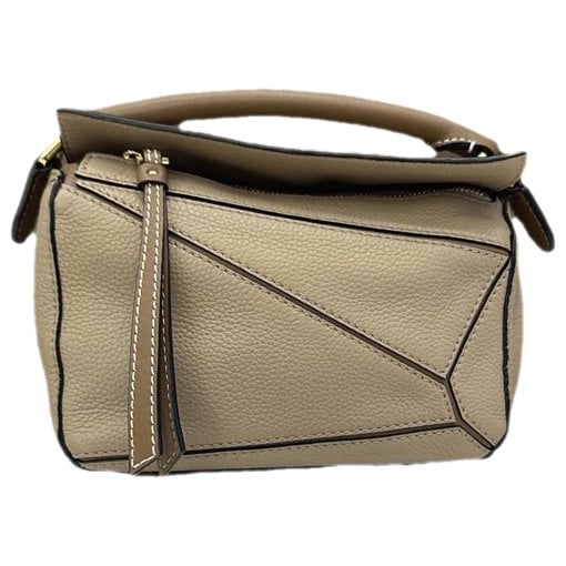 Puzzle leather handbag