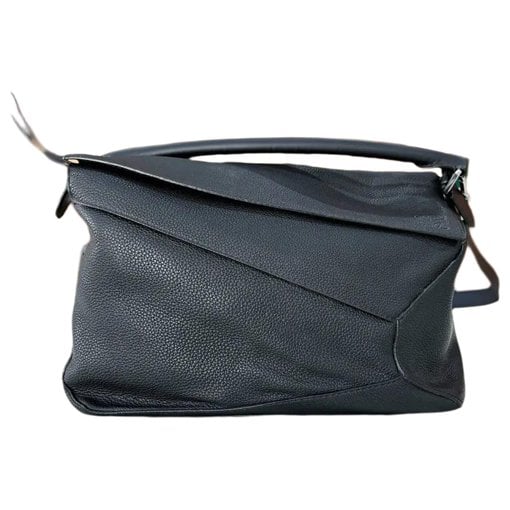 Puzzle leather crossbody bag