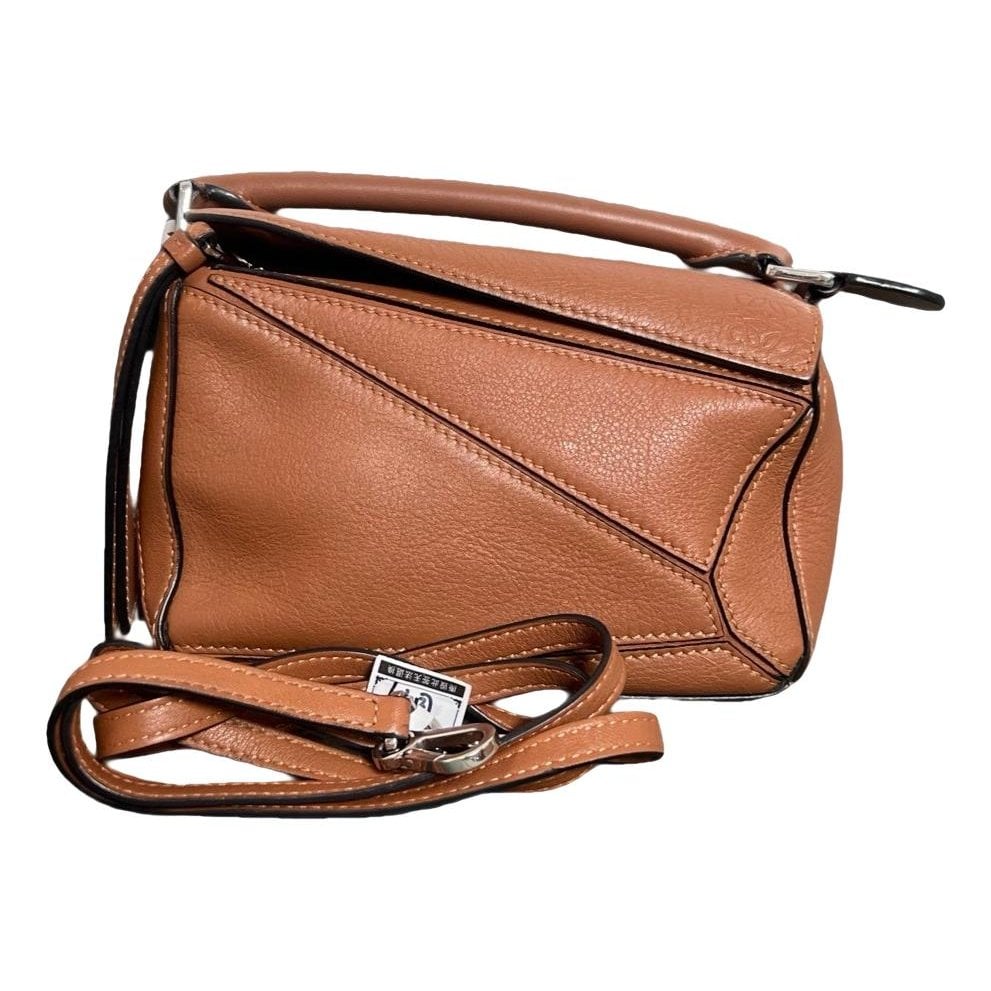 Puzzle leather handbag