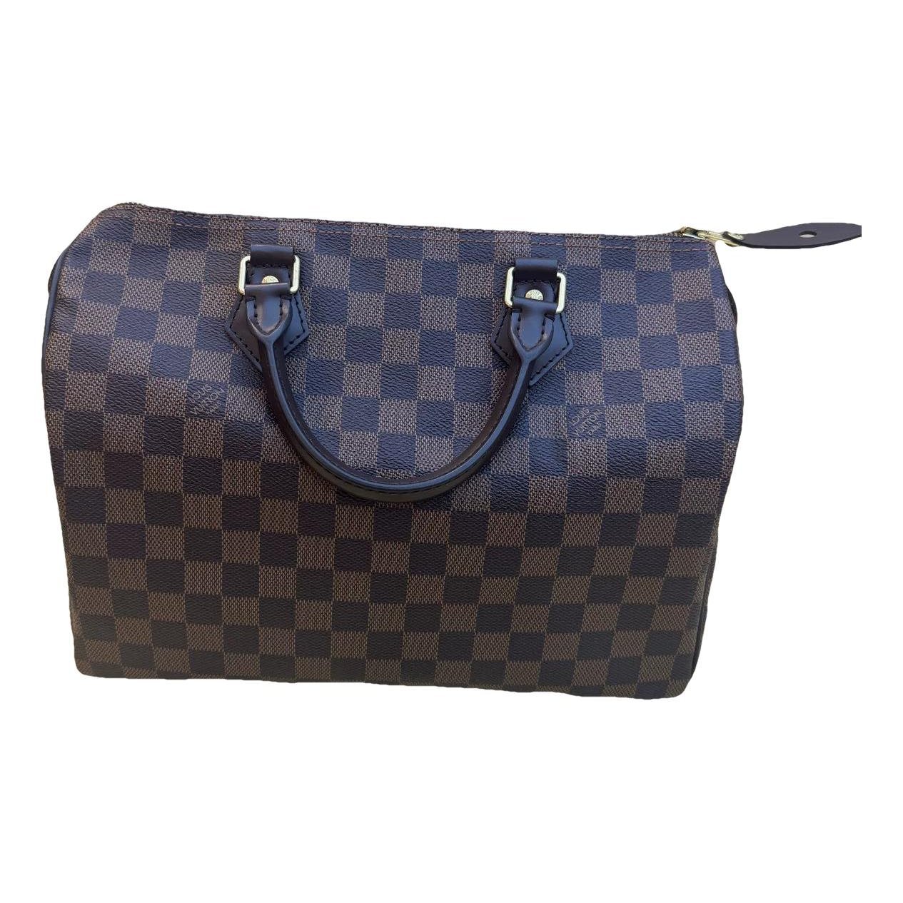 Speedy leather handbag