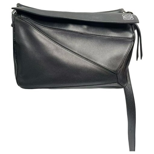 Puzzle leather handbag