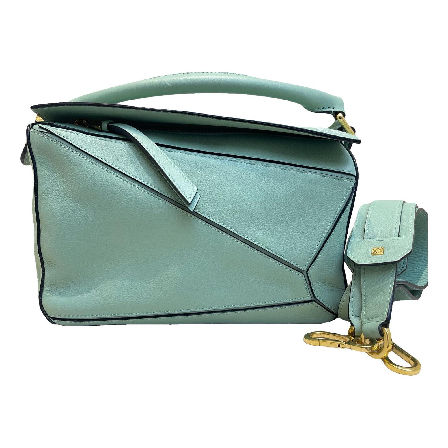 Puzzle leather handbag