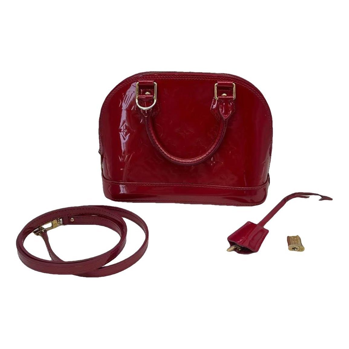 Louis Vuitton Alma BB patent leather handbag
