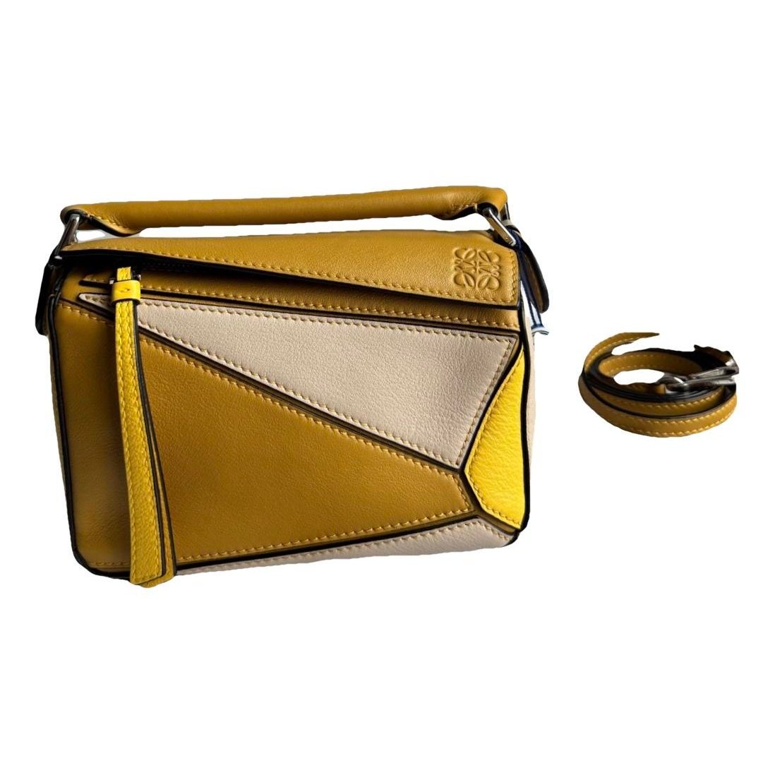 Puzzle leather handbag