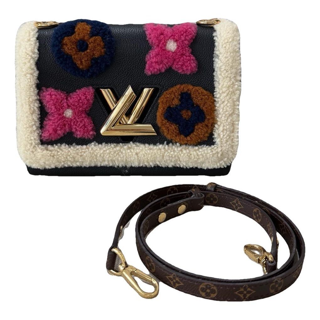 Twist leather crossbody bag