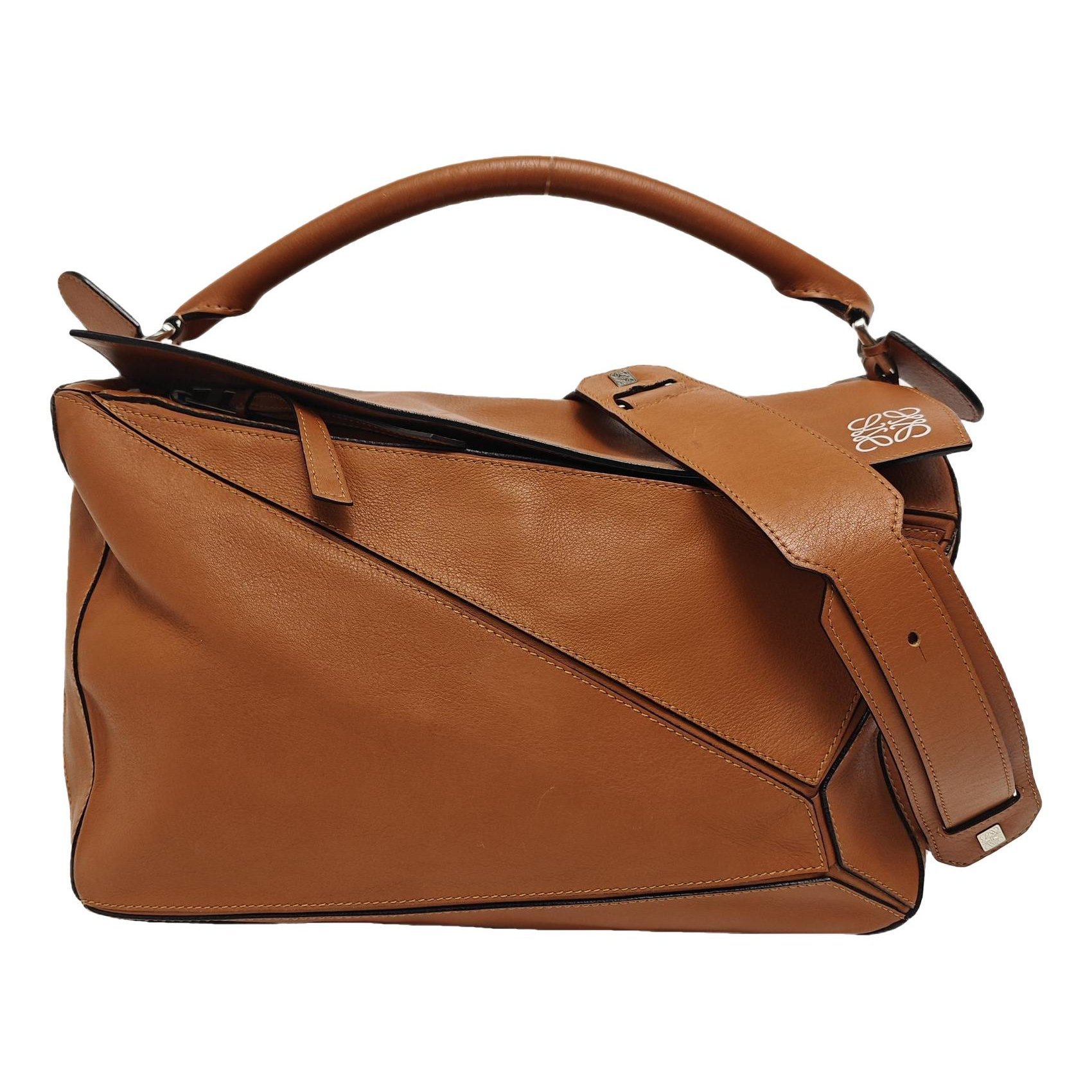 Puzzle leather handbag