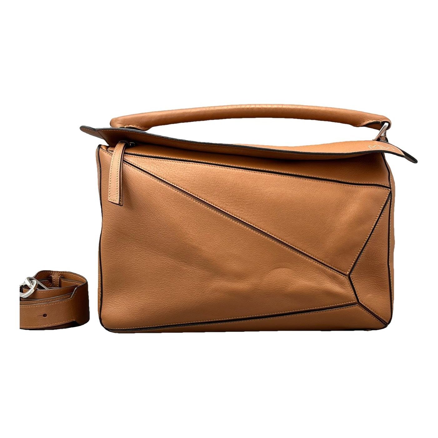 Puzzle leather handbag