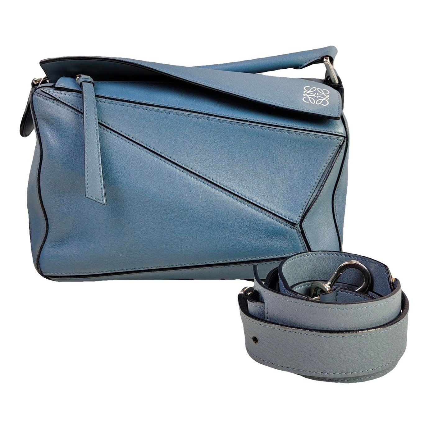 Puzzle leather handbag