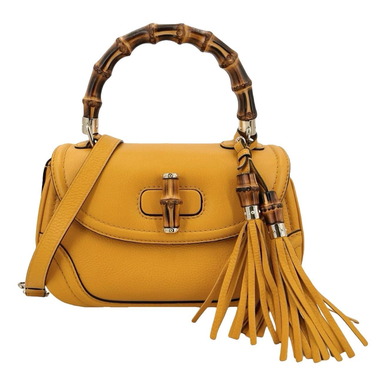 Convertible Pompon Bamboo Top Handle leather handbag