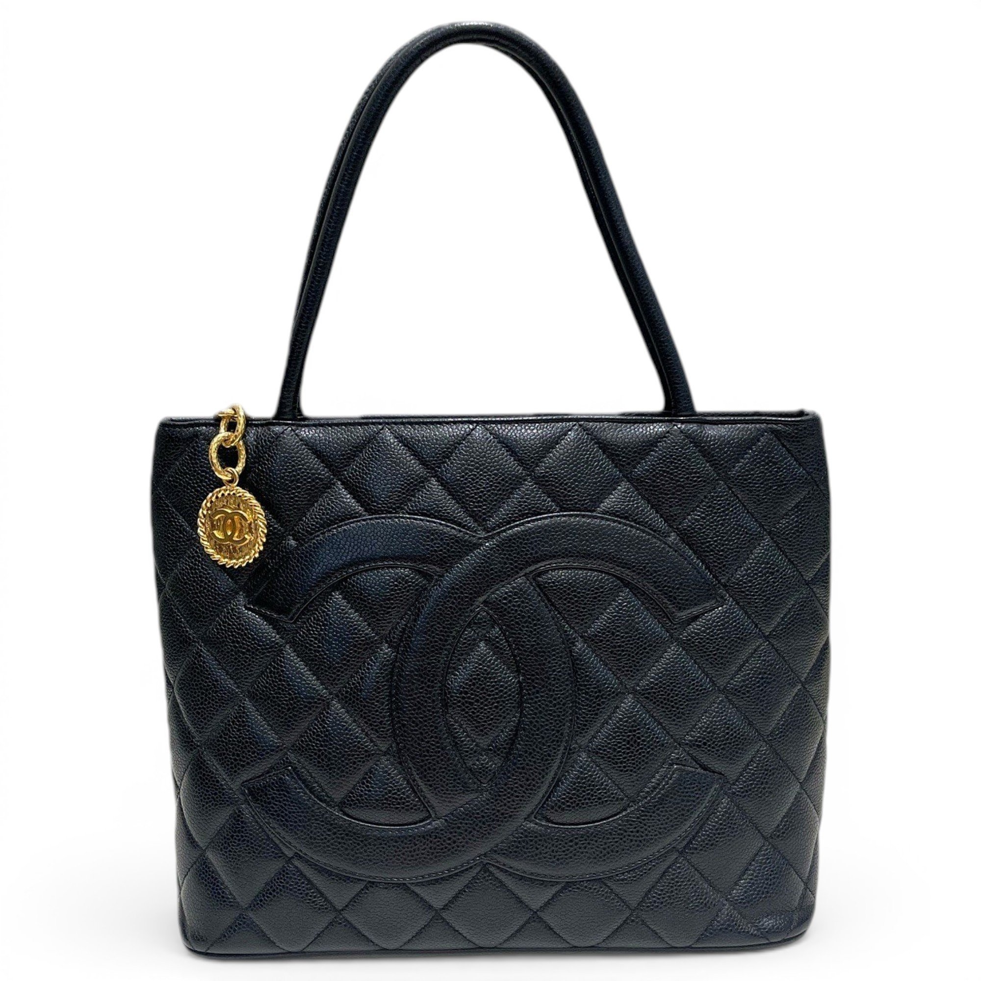 Médaillon leather handbag