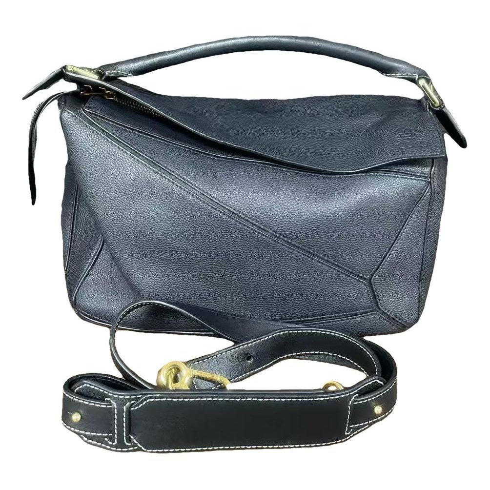 Puzzle leather handbag