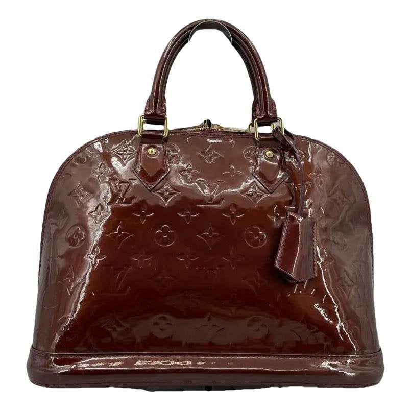 Alma patent leather handbag