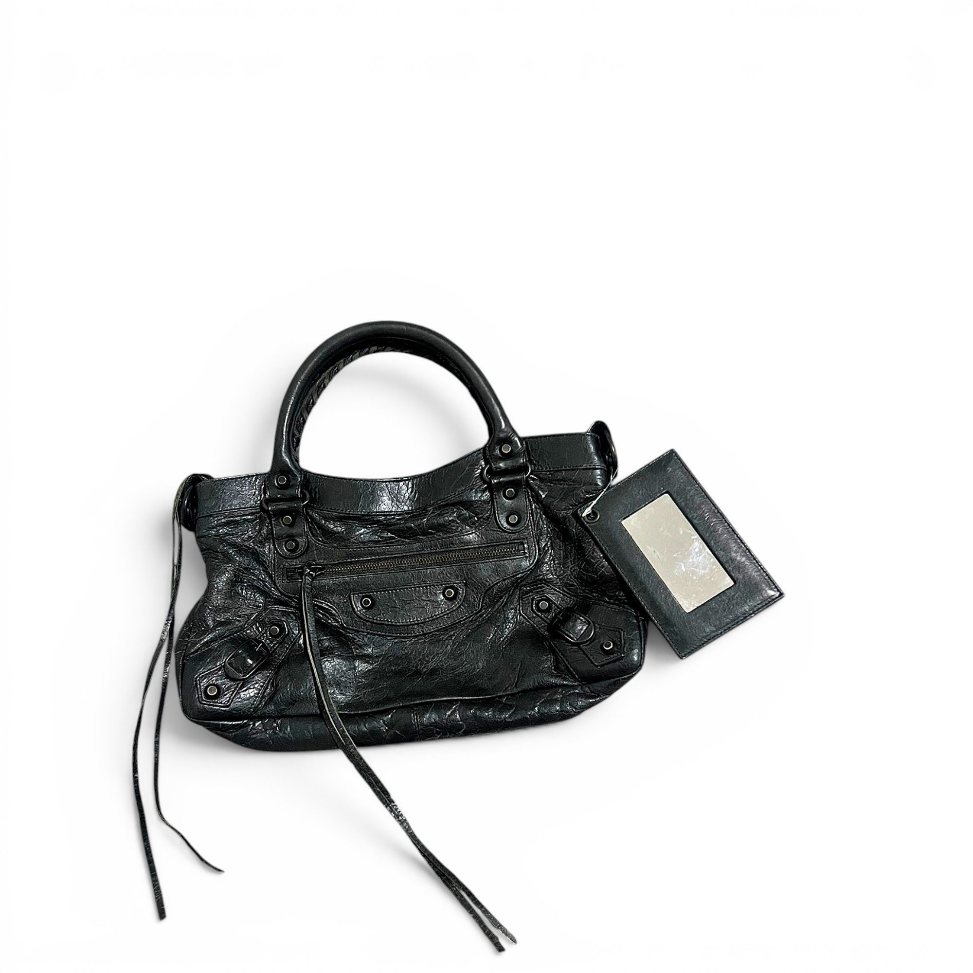 First leather handbag
