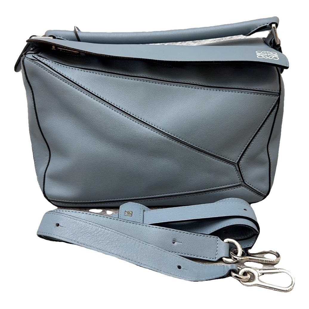 Puzzle leather handbag
