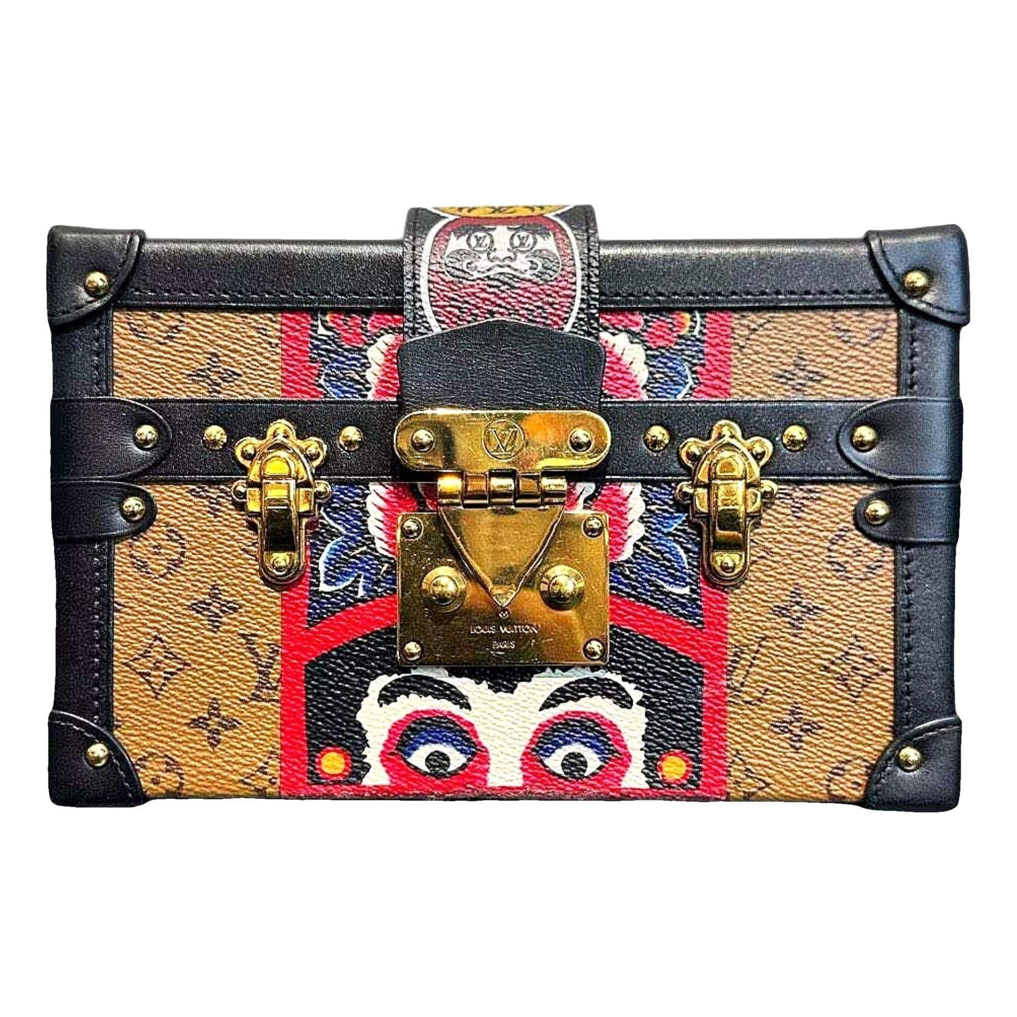 Pochette Trunk leather handbag