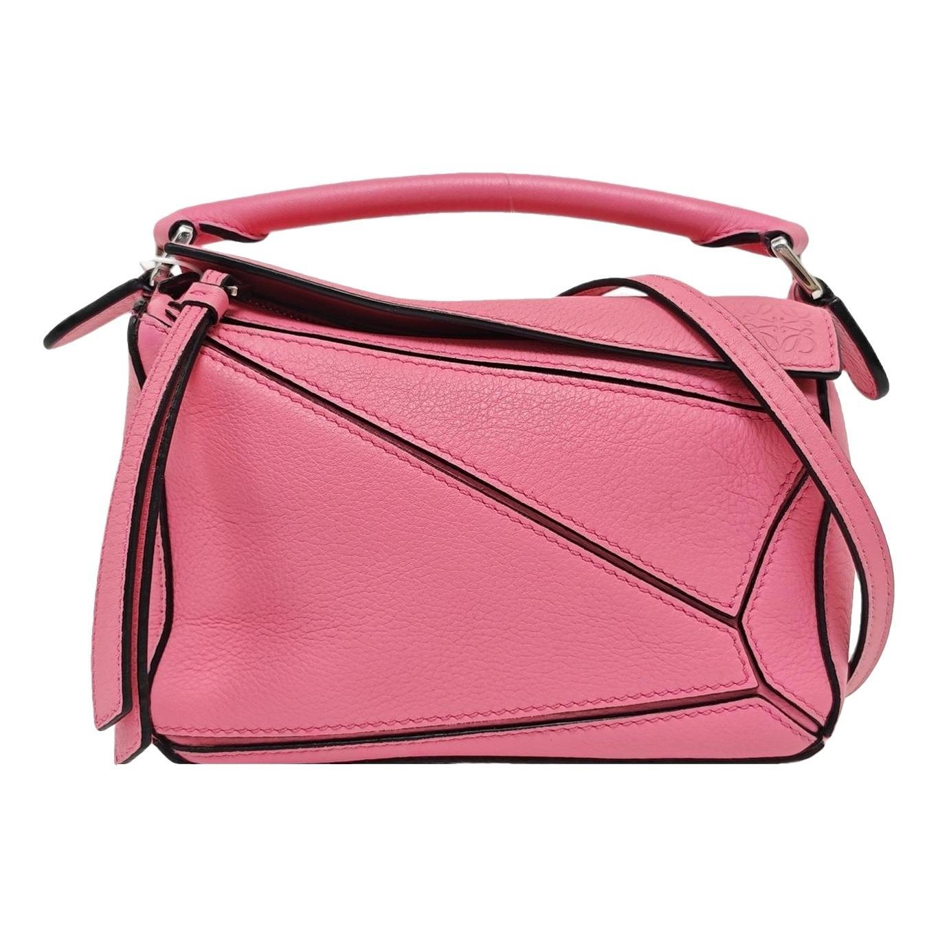 Puzzle leather handbag