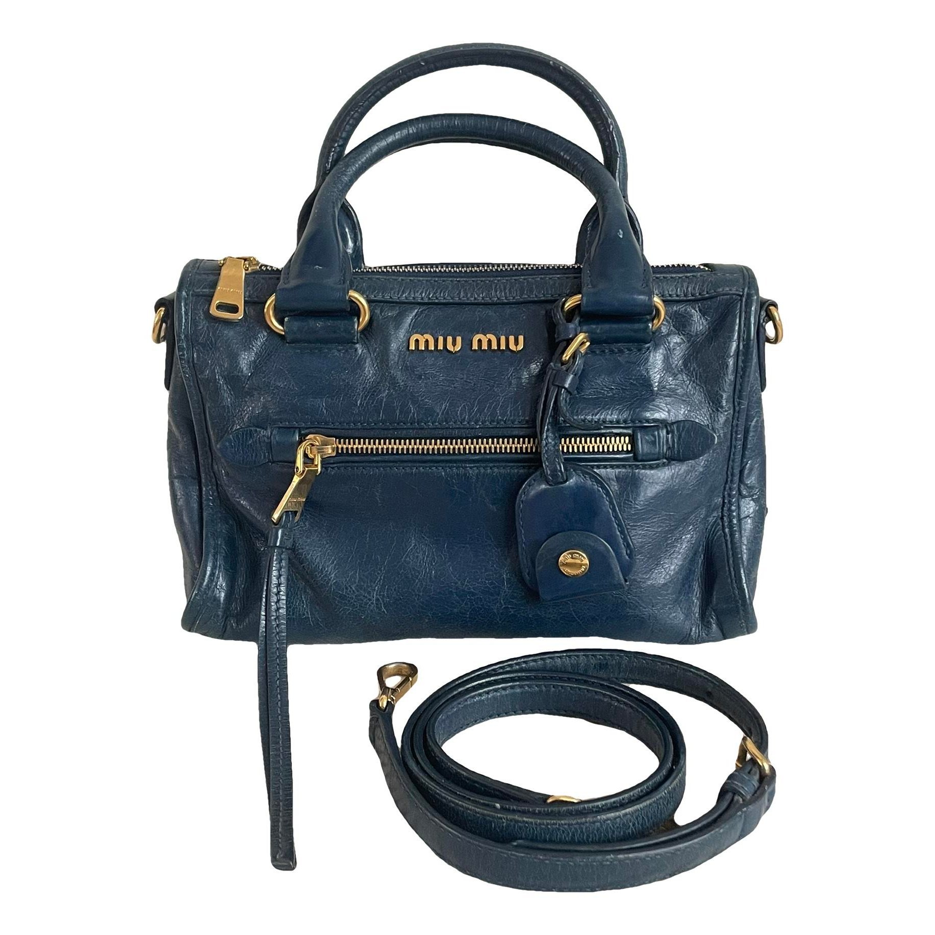 Bow bag leather handbag