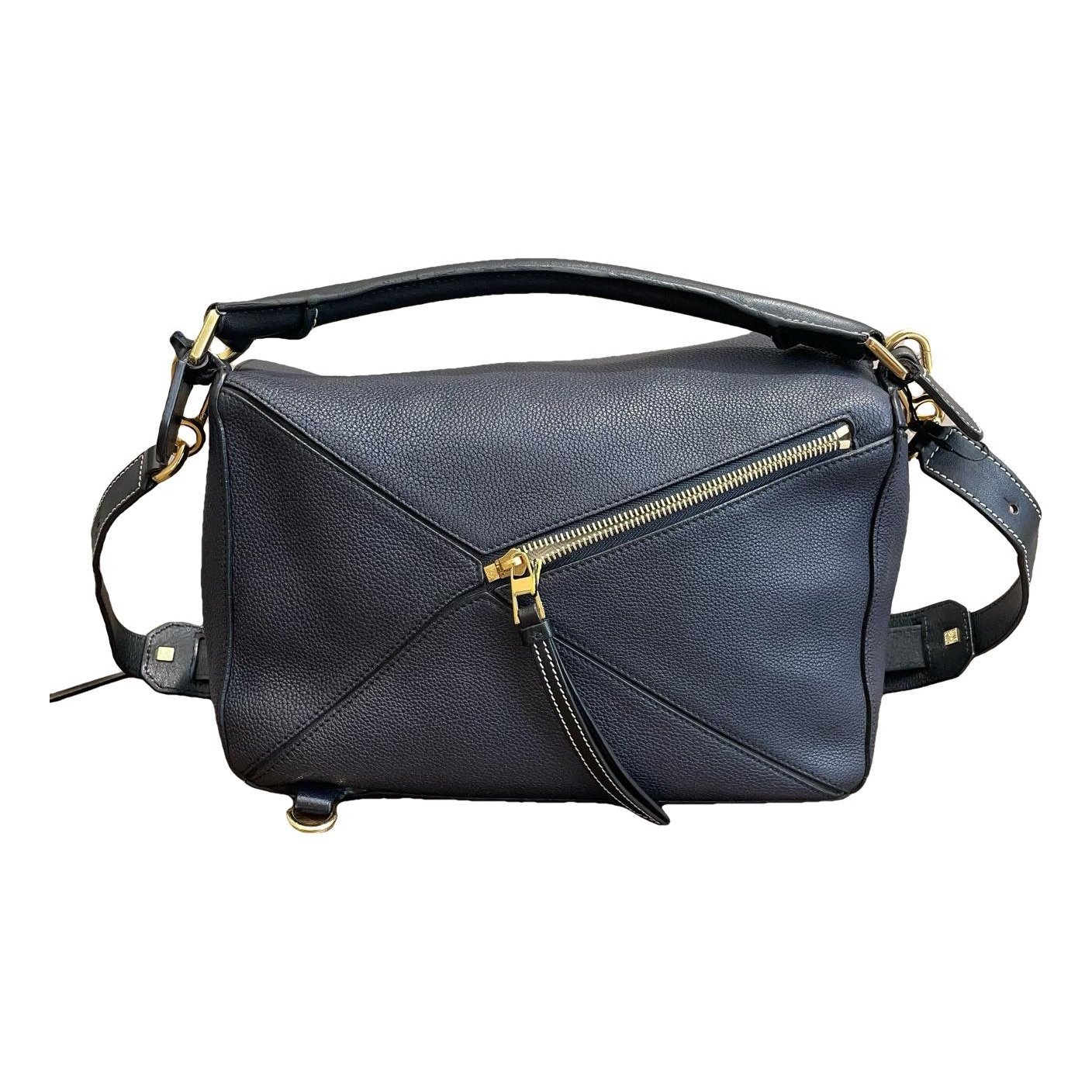 Puzzle leather handbag