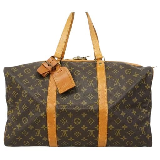 Louis Vuitton Sac souple leather travel bag