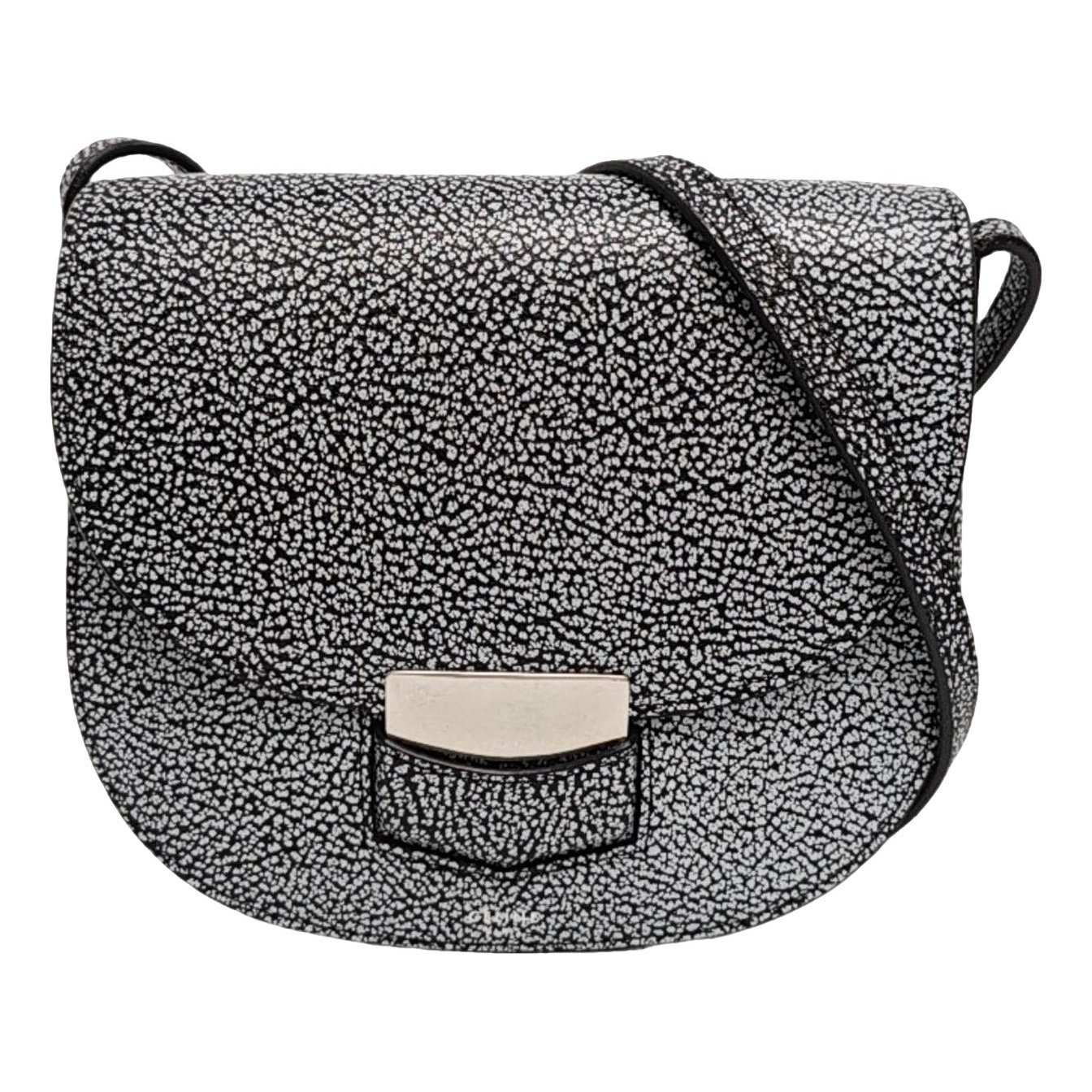 Trotteur leather handbag
