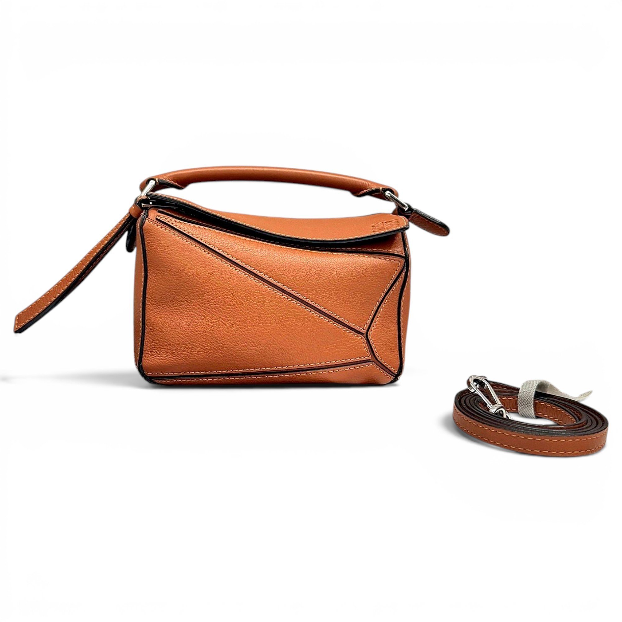 Puzzle leather handbag