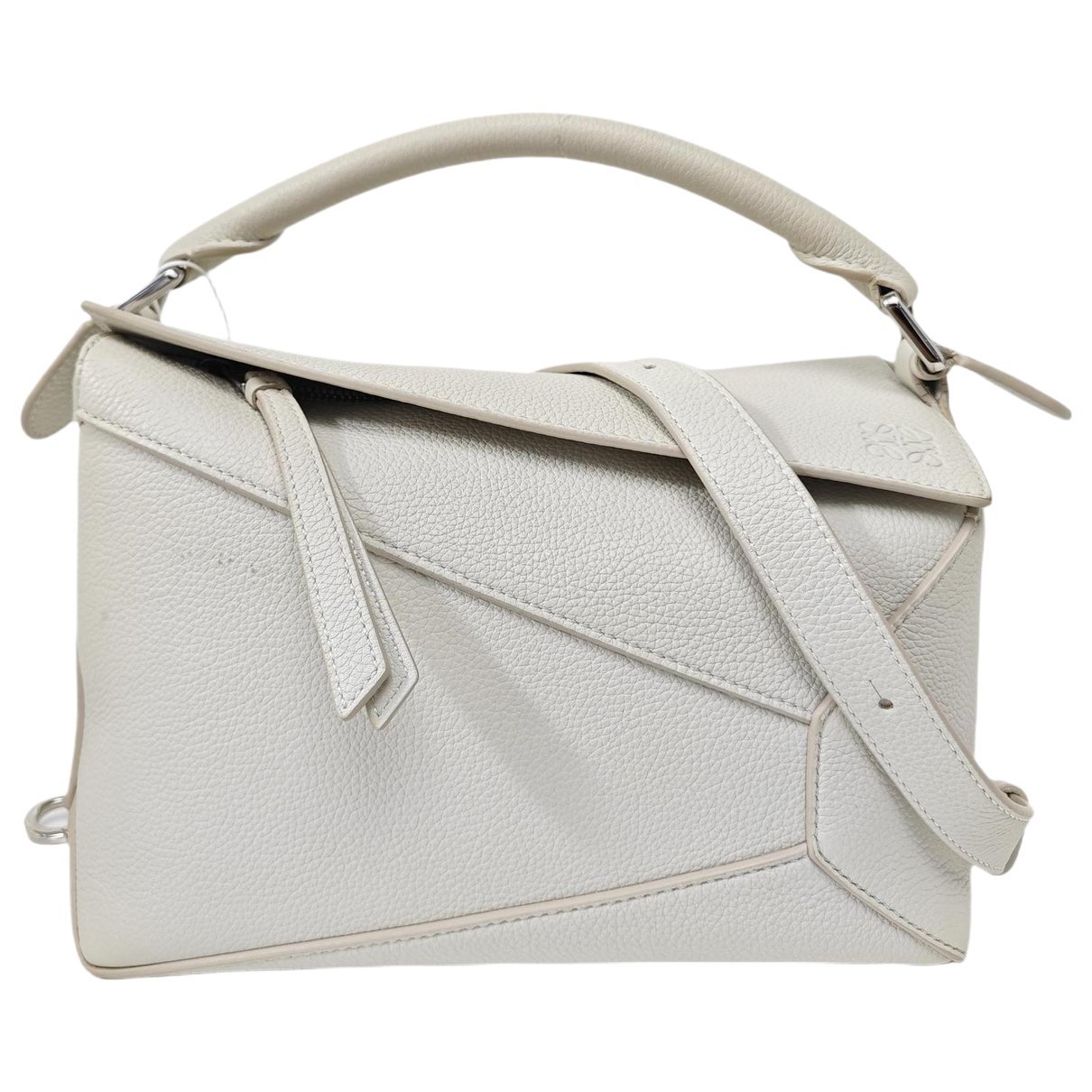 Puzzle leather handbag