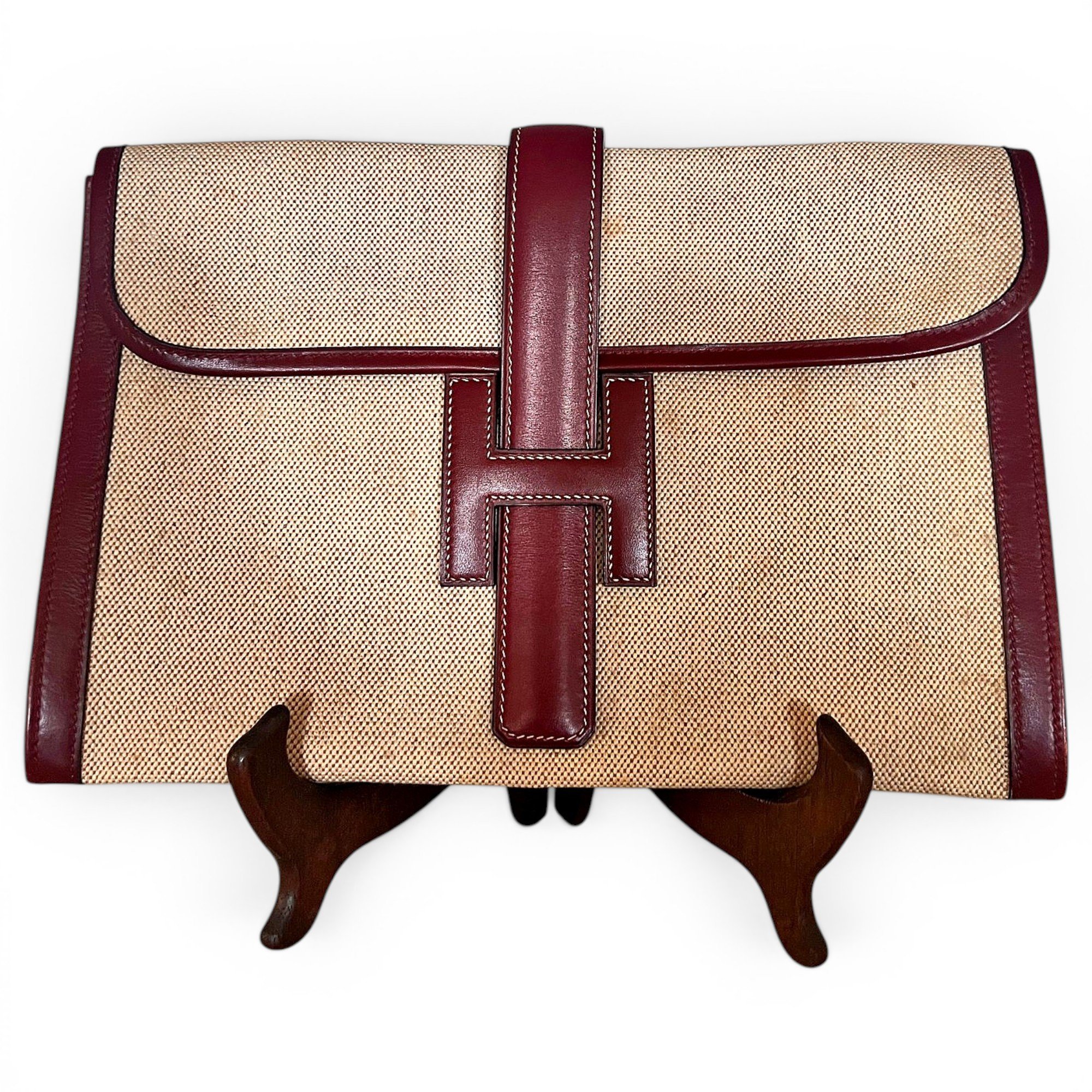 Jige leather clutch bag