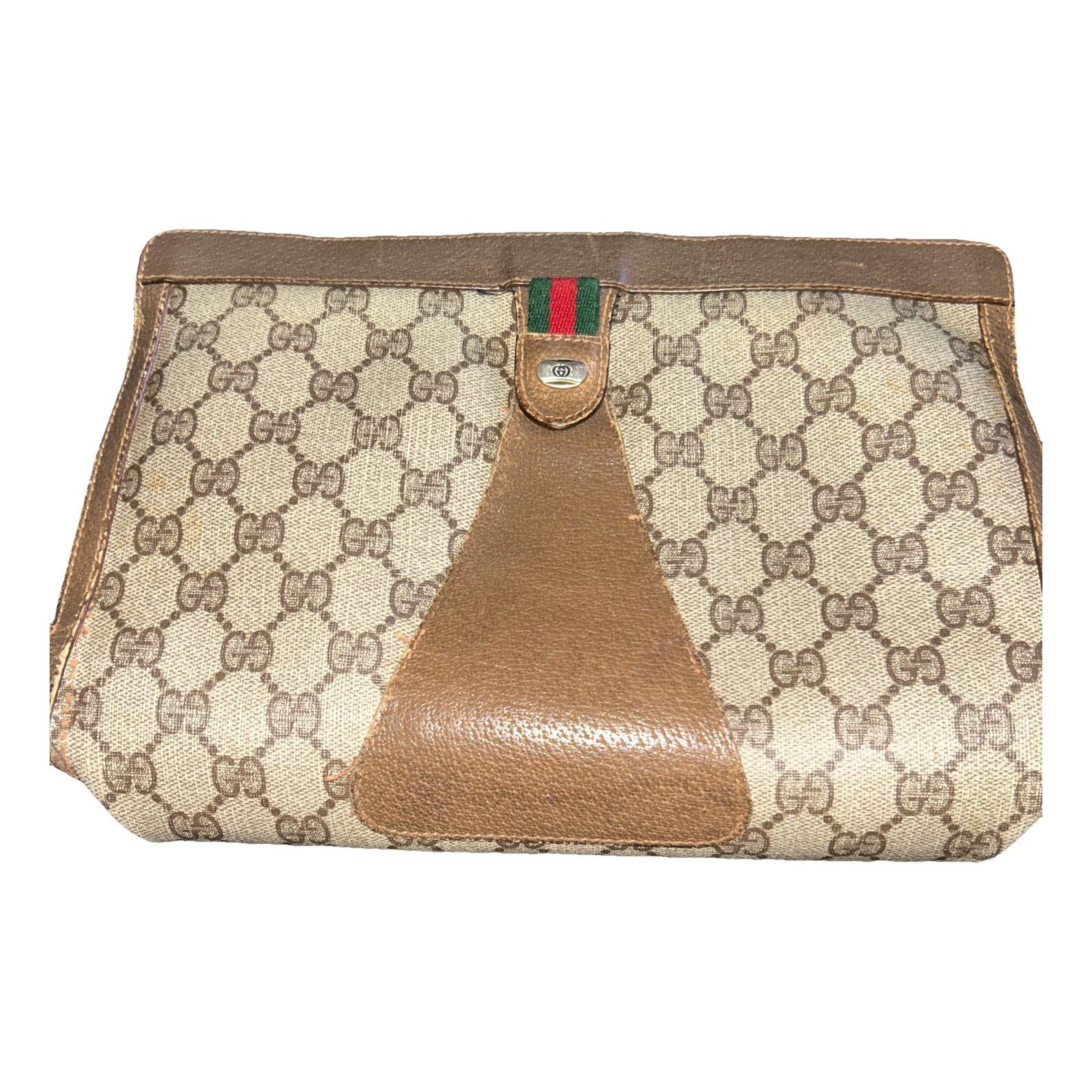 Ophidia leather clutch bag