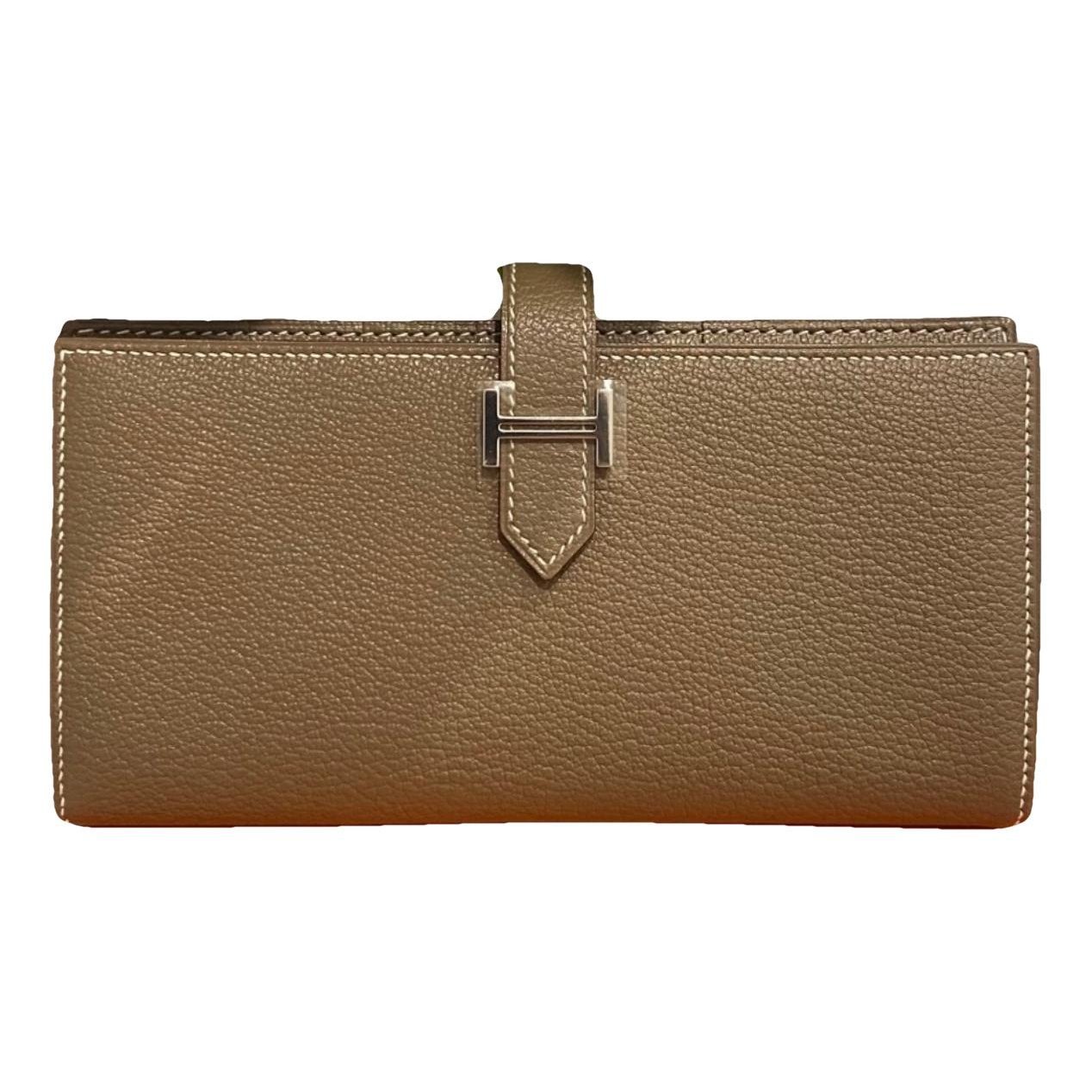 Jige leather clutch bag