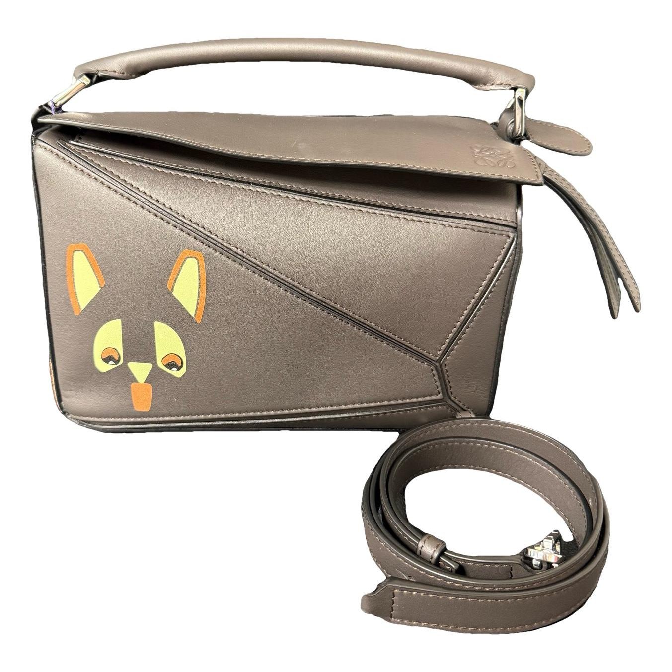 Puzzle leather handbag
