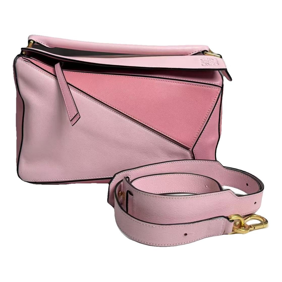 Puzzle leather handbag