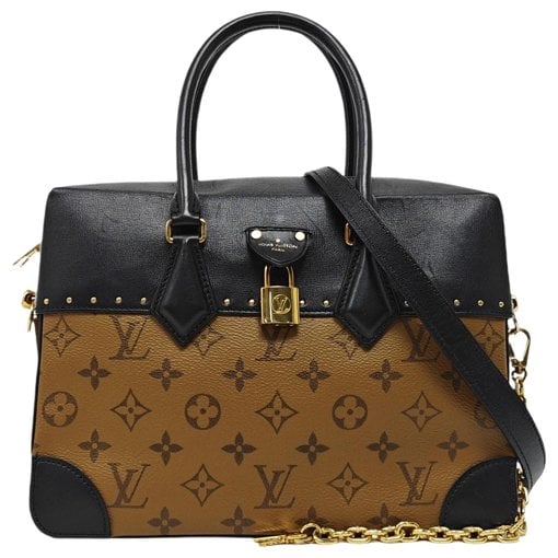 Petite Malle leather handbag