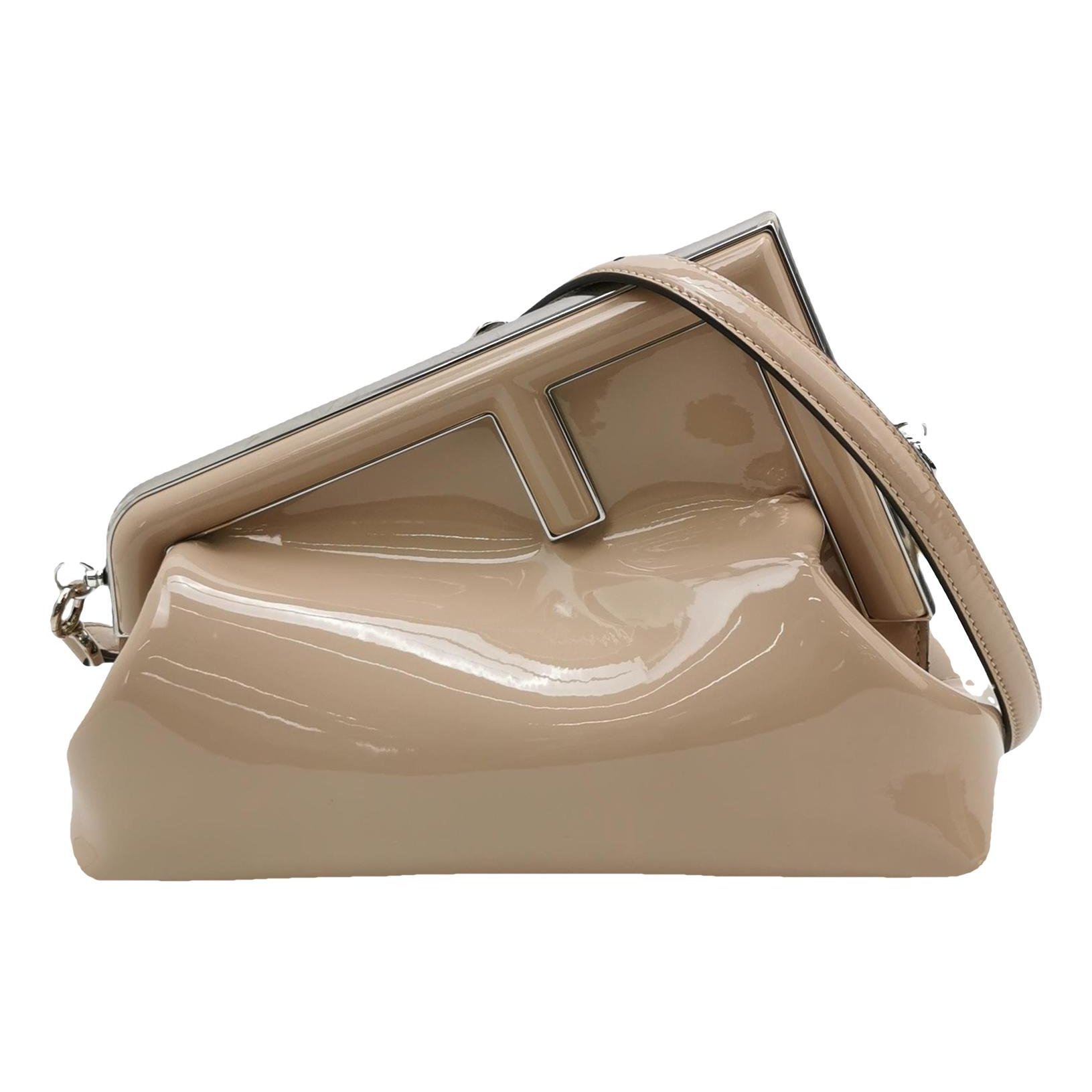 First leather handbag