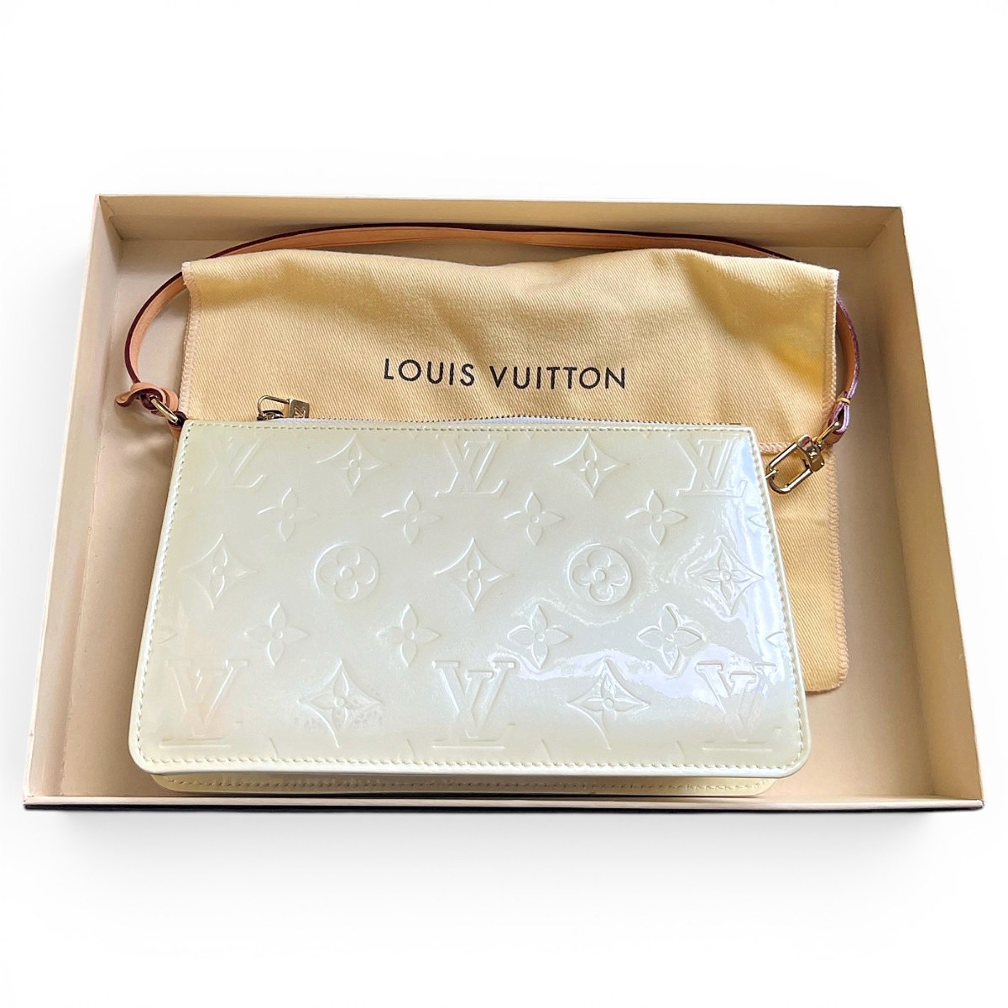 Pochette Accessoire patent leather handbag