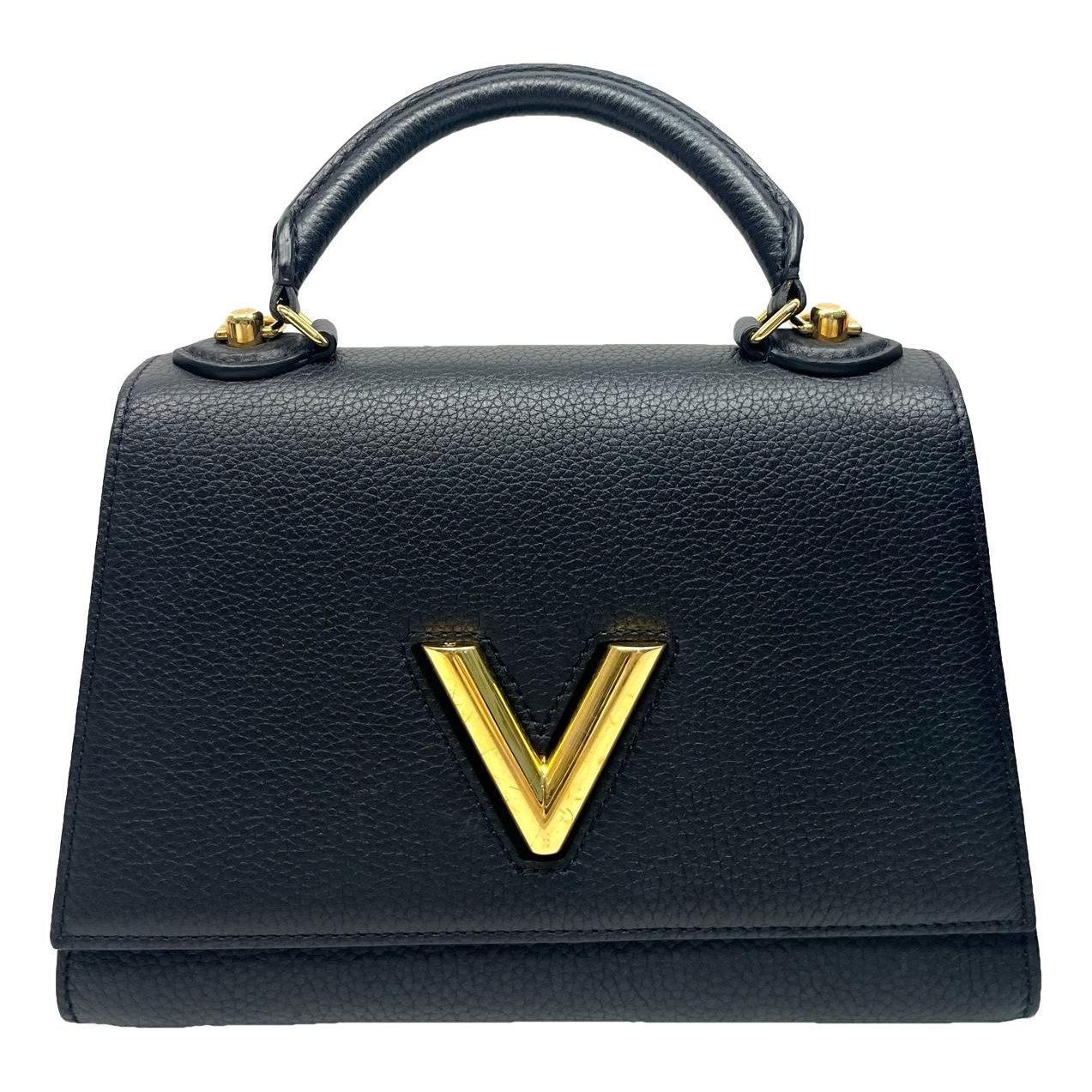 Twist One Handle leather handbag