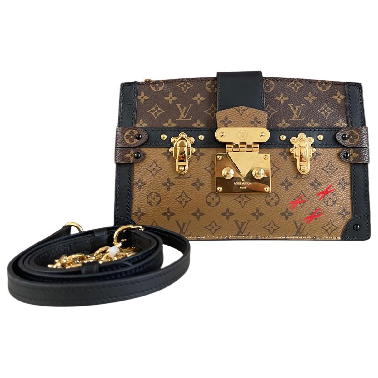 Pochette Trunk leather handbag