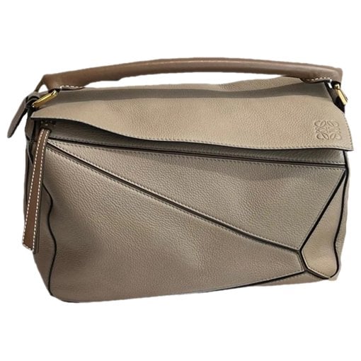 Puzzle leather handbag