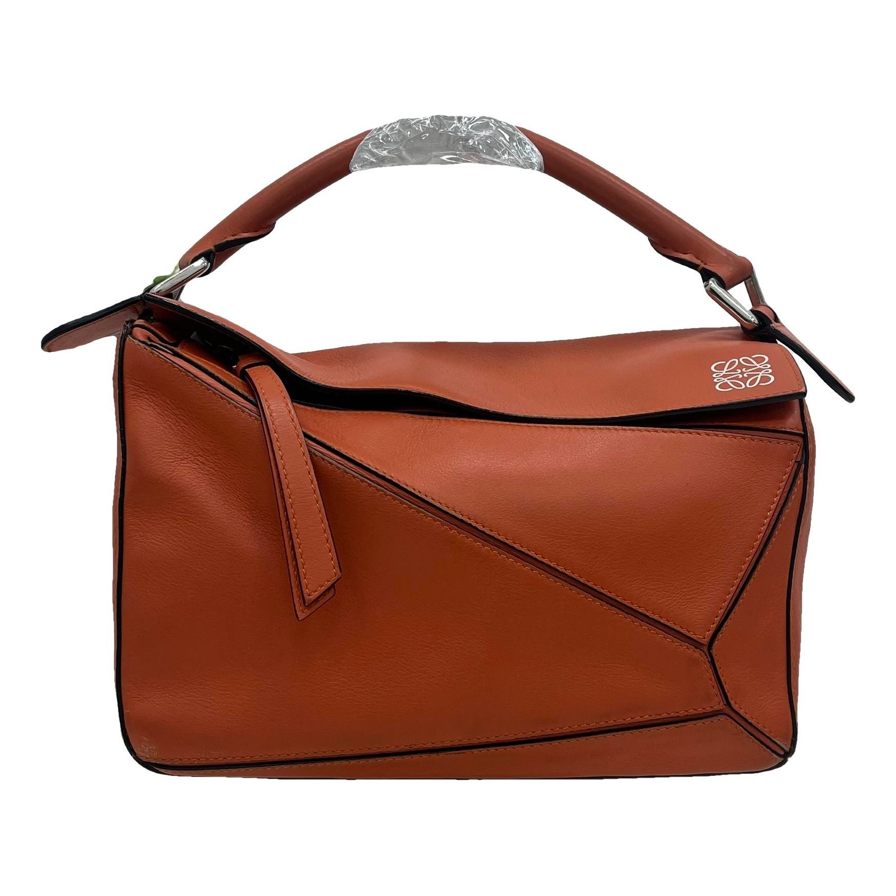 Puzzle leather handbag