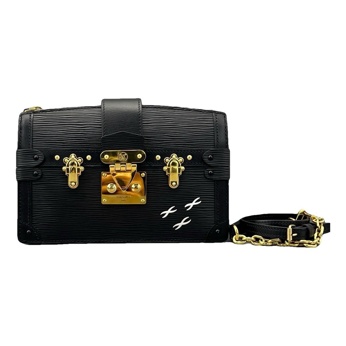 Pochette Trunk leather handbag
