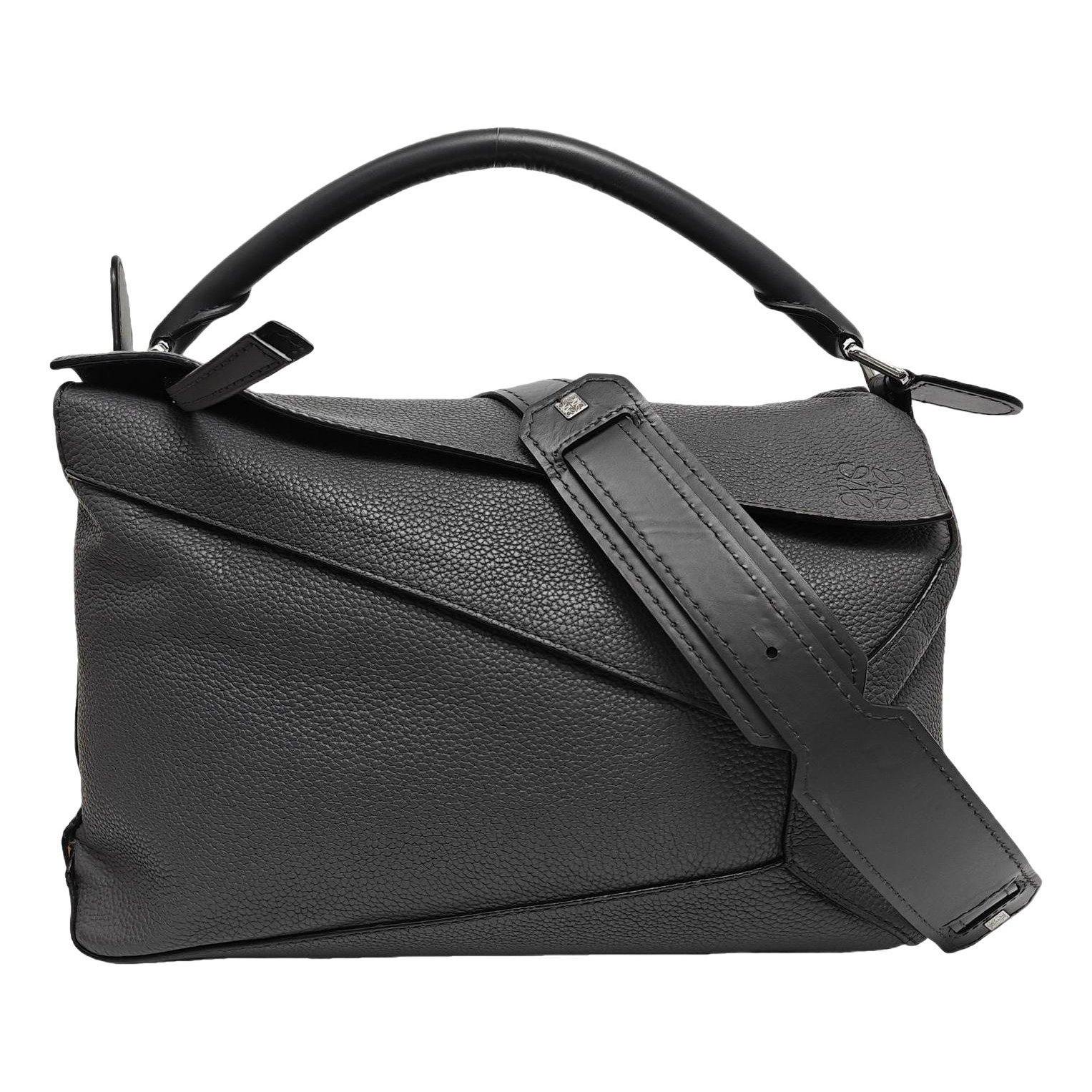 Puzzle leather crossbody bag