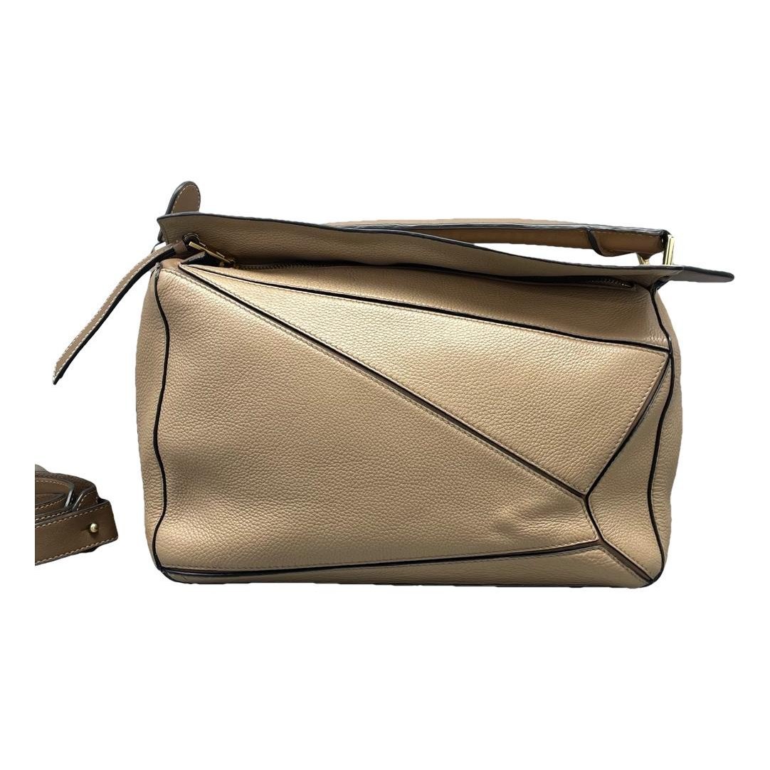 Puzzle leather handbag