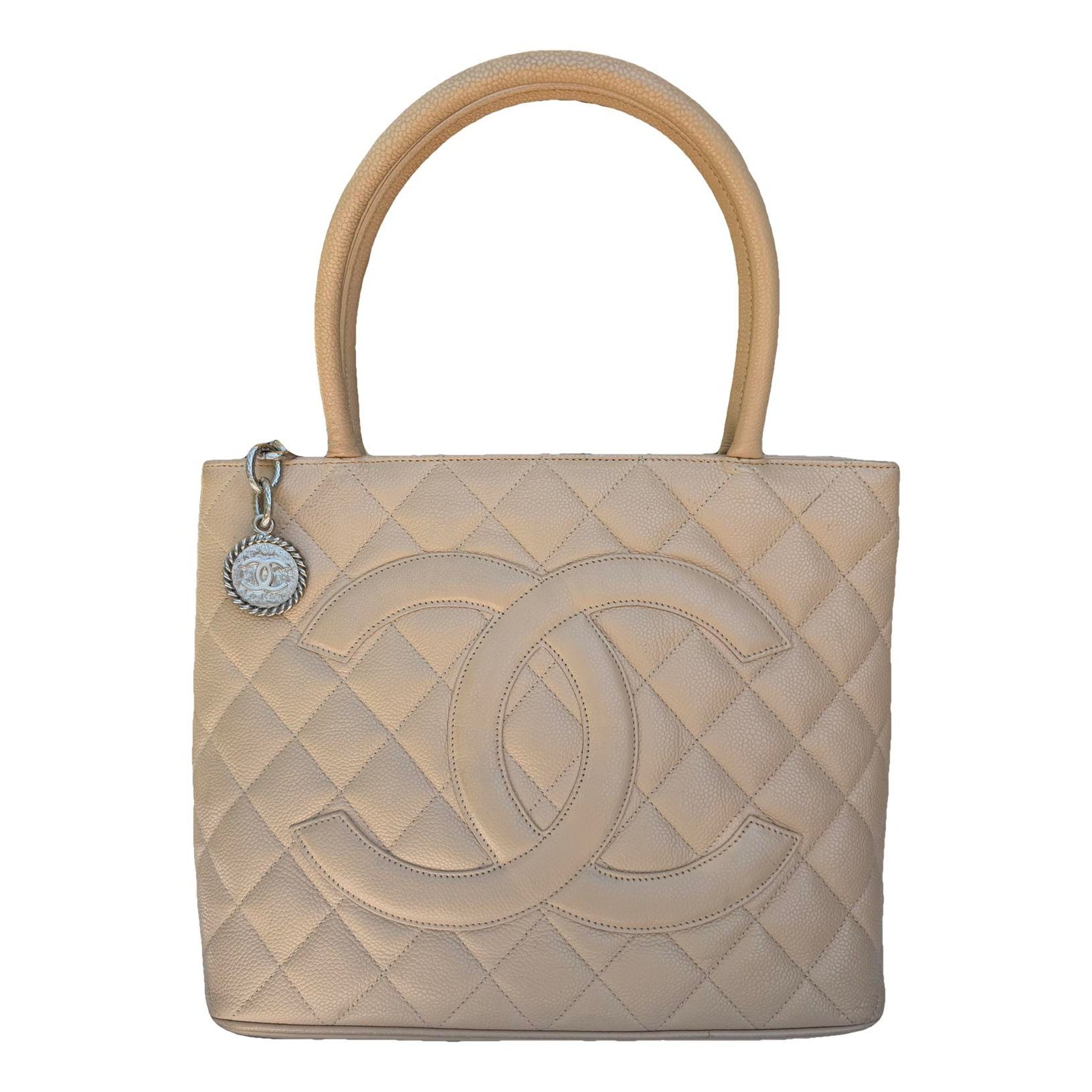 Médaillon leather handbag