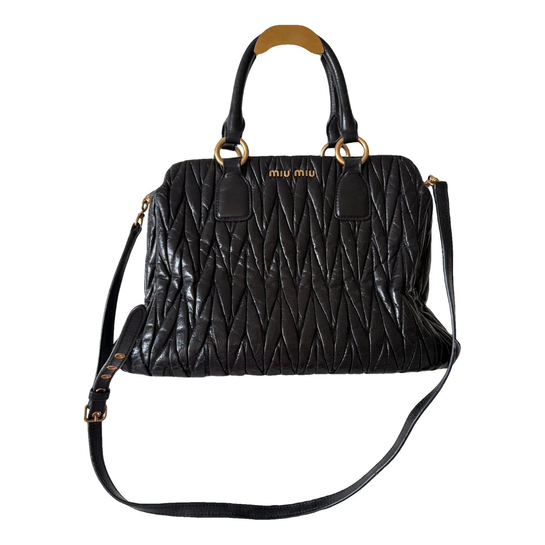 Matelassé leather clutch bag