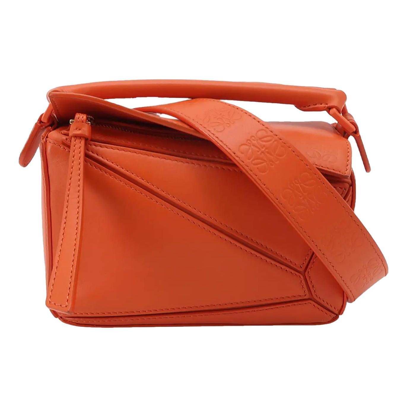 Puzzle leather crossbody bag