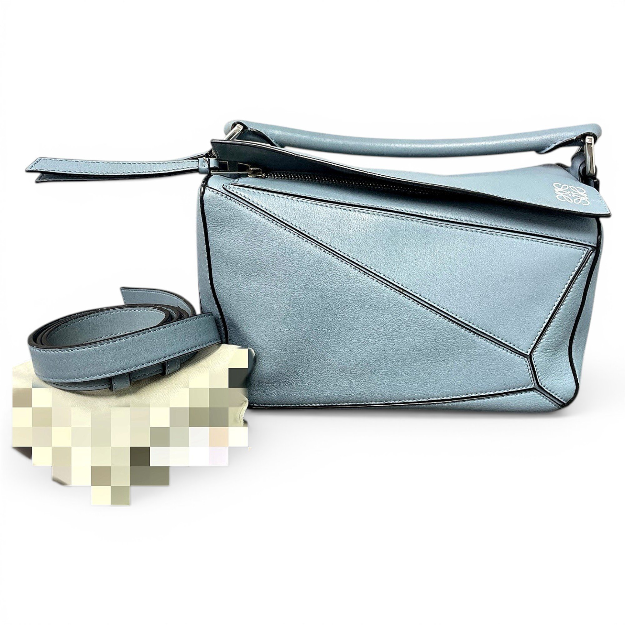 Puzzle leather handbag