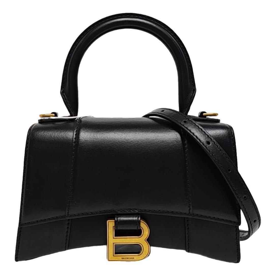 Hourglass leather handbag