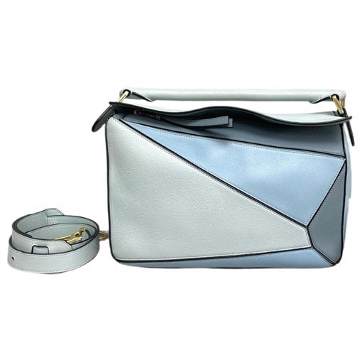 Puzzle leather handbag