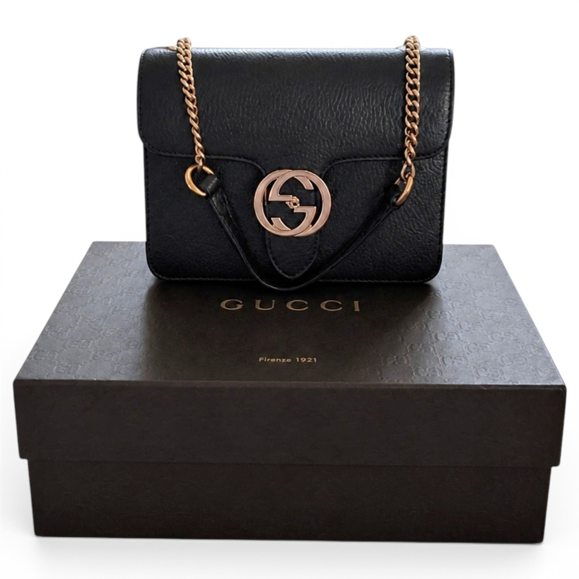 Interlocking leather handbag
