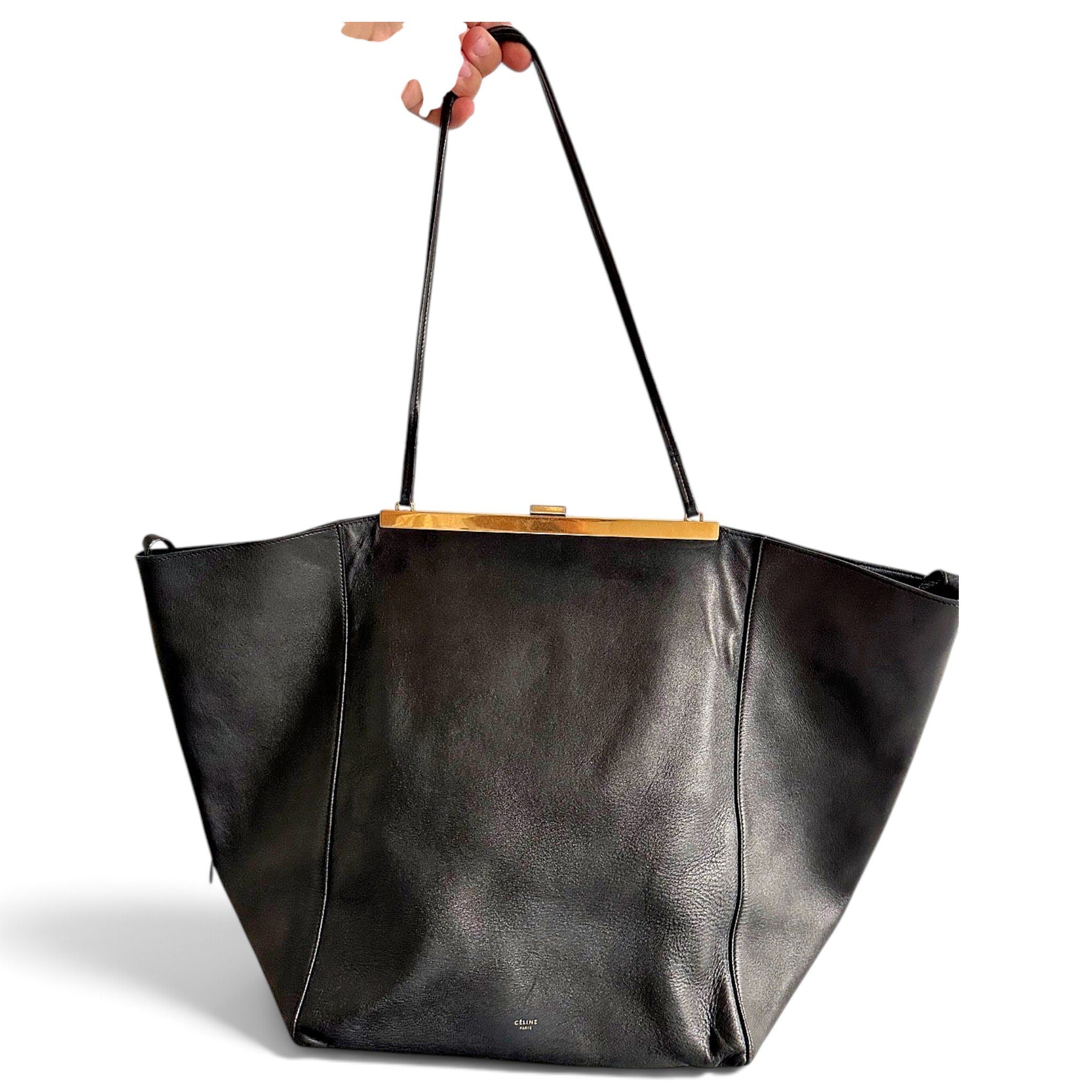 Clasp leather handbag